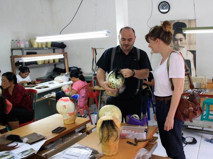 Catherine Biggs from Ireland visiting the wig production in Bali Sari Rambut Orlando Bassi showing hair piece